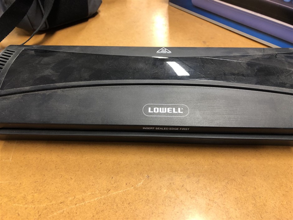 1 x GBC Blizzard laminator, 1 x LOWELL LOOL380 laminator and 1 x CANON Ixus Auction (0045