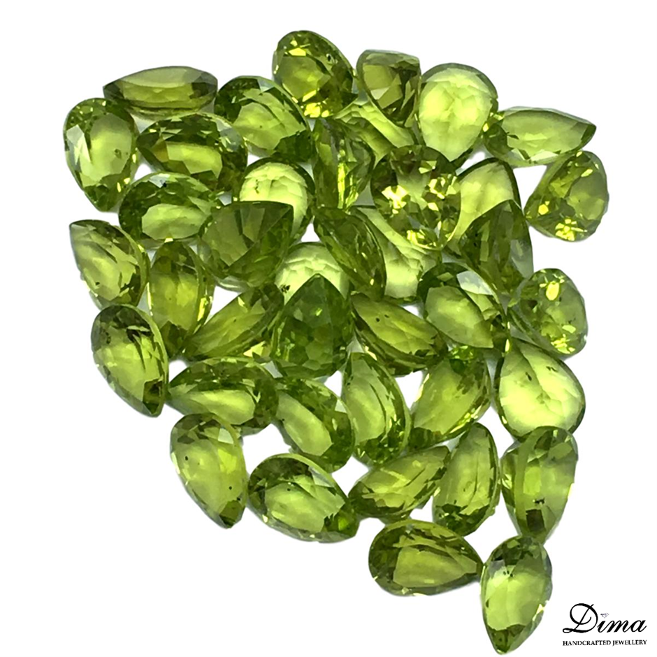 Forty Loose Peridots, 50.22ct in Total Auction (00012526851) Grays