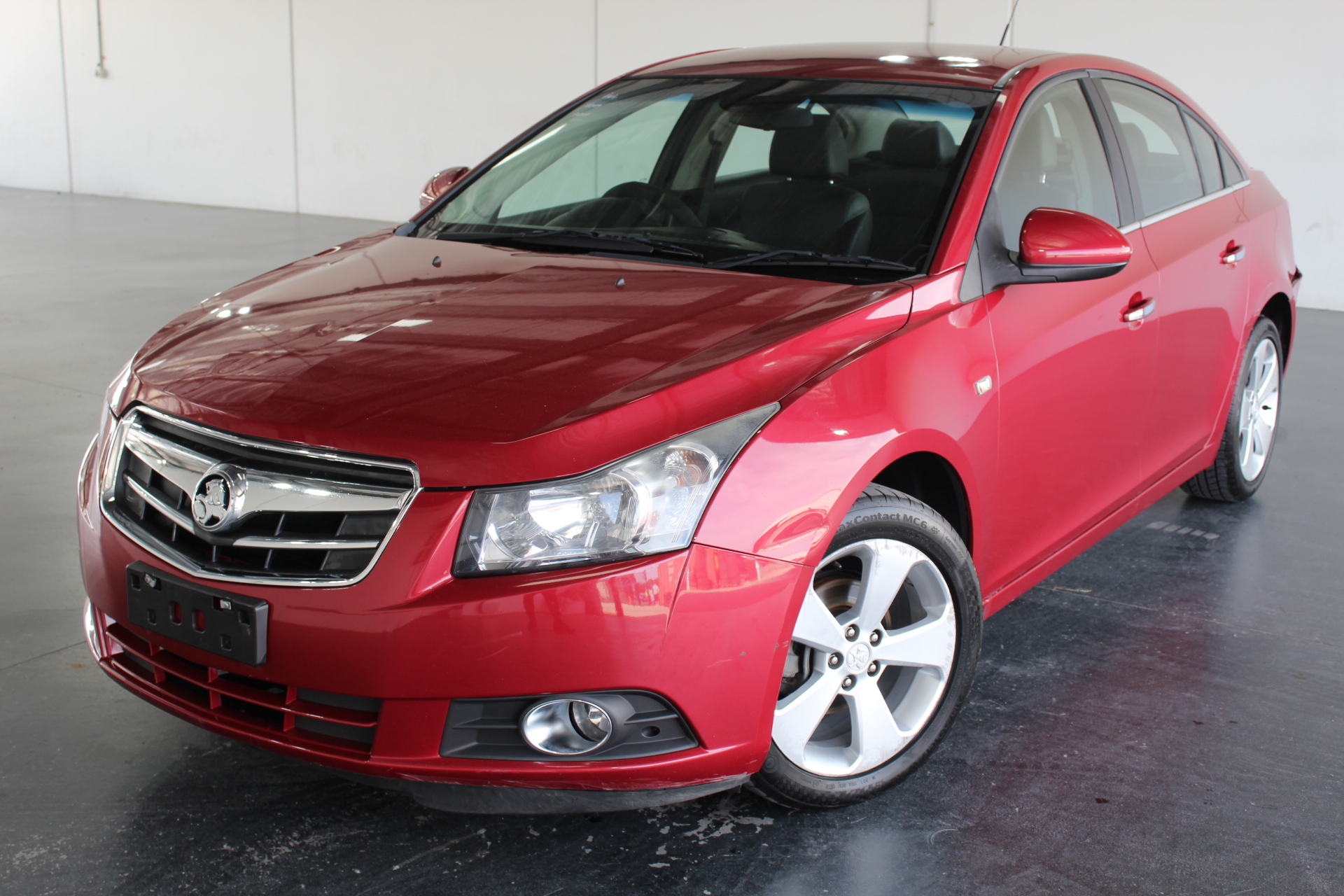 Designer Simulated Diamond Swirl Ring in Gold - US Size 7