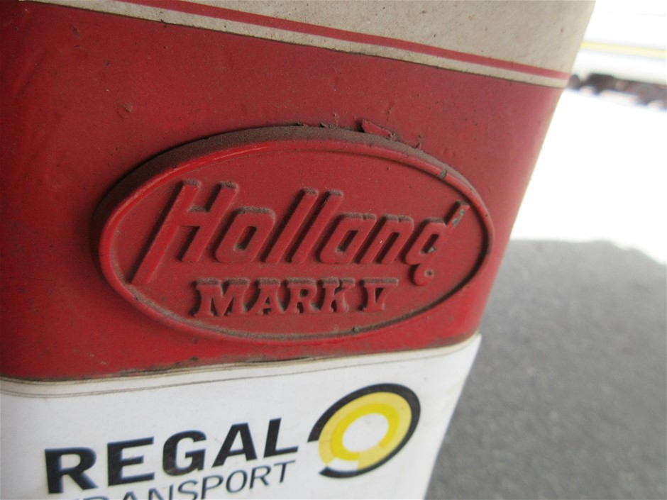 Rash Vest Made With Water Reactive Fabric Showing Dolphin Print When Wet