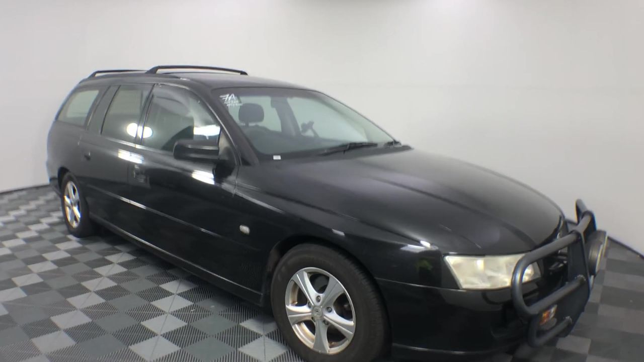 ROXY Girls' Whole Hearted L/S Swim Top, Size 4, Black (KVJ0), ERLWR03225. R