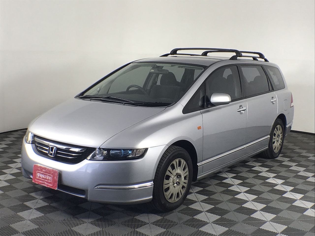 Designer Green & Simulated Diamond Square Stud Earrings in Silver