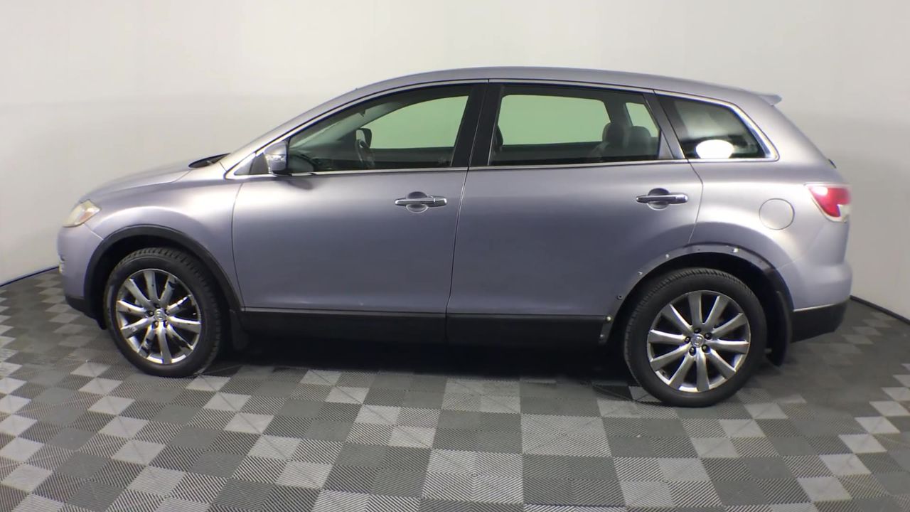 <B>9K Yellow Gold Twisted Hollow Hoop Earrings 25Mm</B><P>