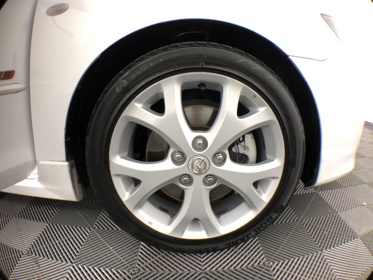 1.30ct & 1.10ct Emerald Cut Rubies & Dia. 0.56ct G/SI Earrings 18K