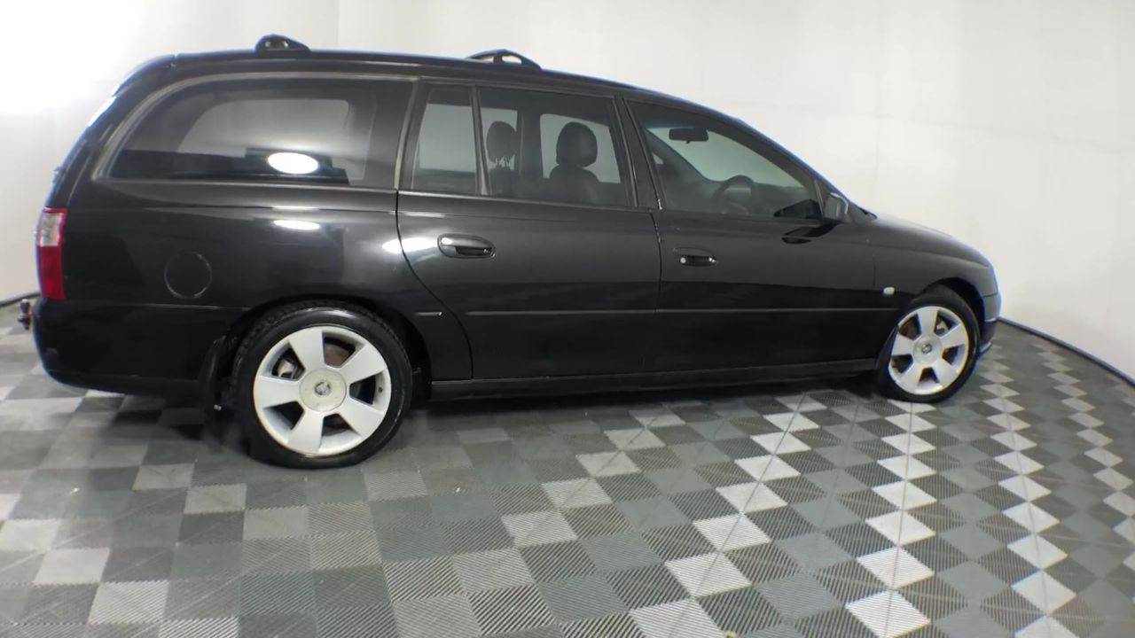 Rhodium Plated 7 Ring Lucky Charm Necklace