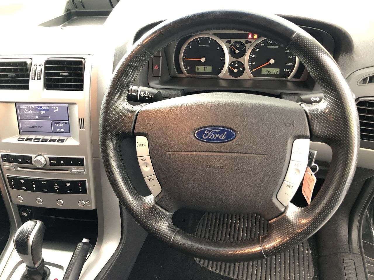 Designer Simulated Diamond Round Black Drop Earrings in Gold