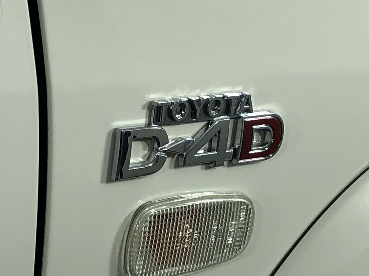 Designer Simulated Diamond Ball Bracelet with Braided Brown Band