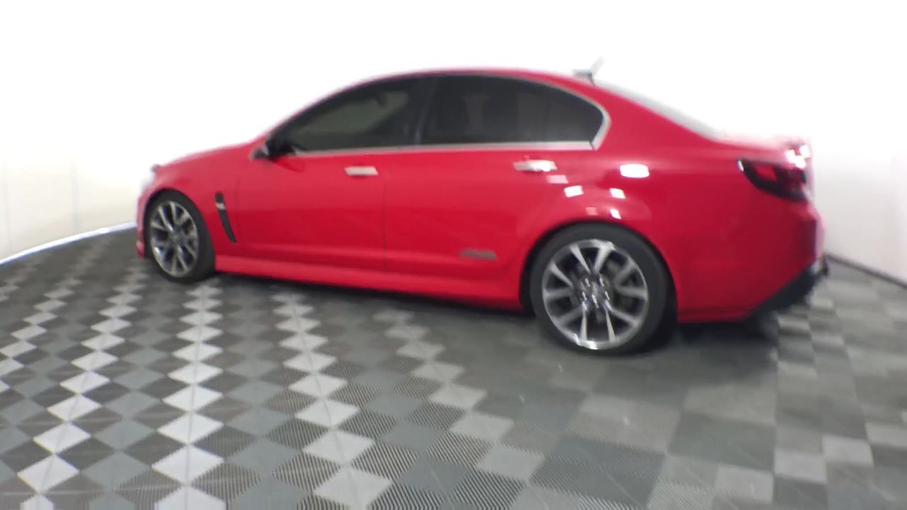 Rhodium Plated Simulated Ruby Filigree Heart Locket