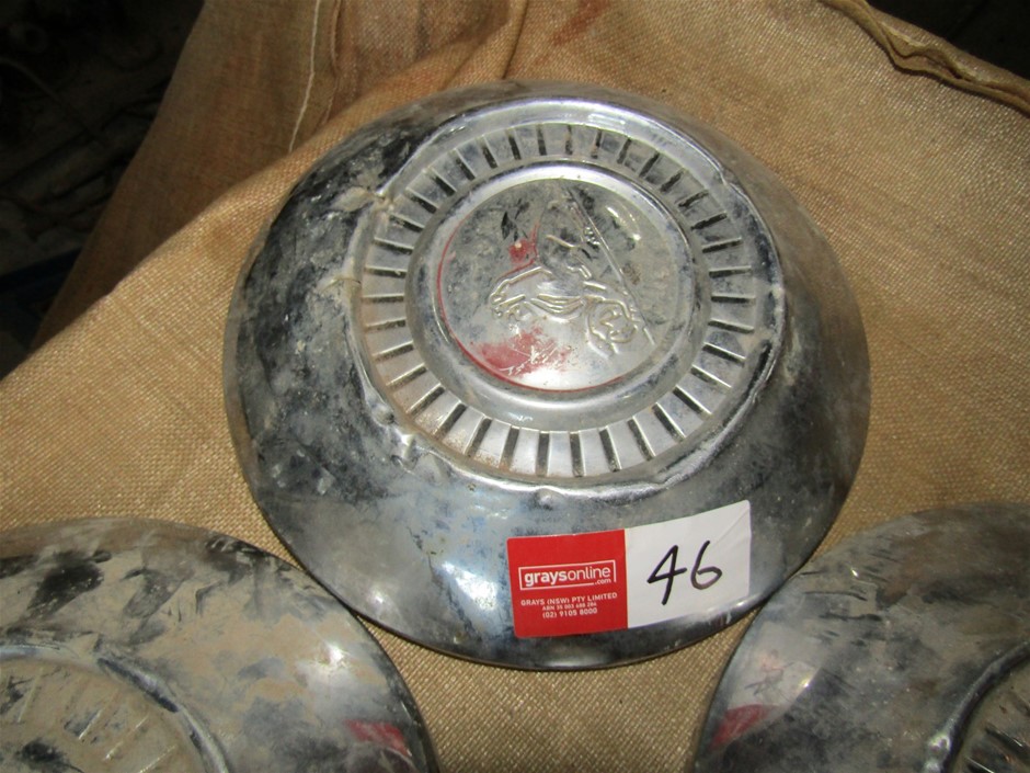 Set of 4 FJ Holden Hub caps Auction (00465042380) Grays Australia
