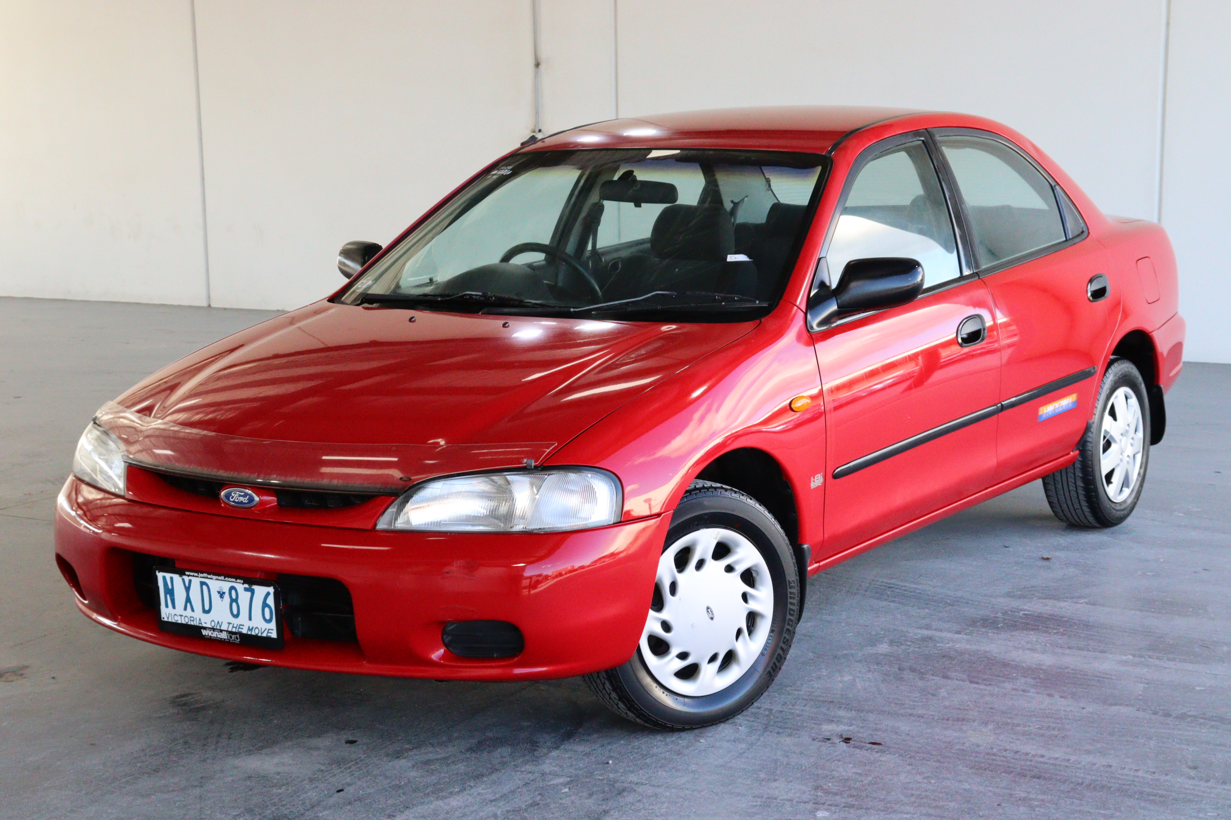 1996 Ford Laser LXi KJ Manual Sedan Auction (0001-3492241) | Grays ...