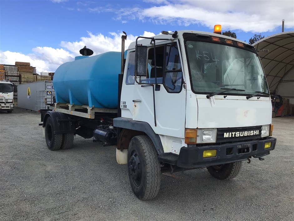 <p>1985 Mitsubishi  FM515JA 4 x 2 Water Truck</p>