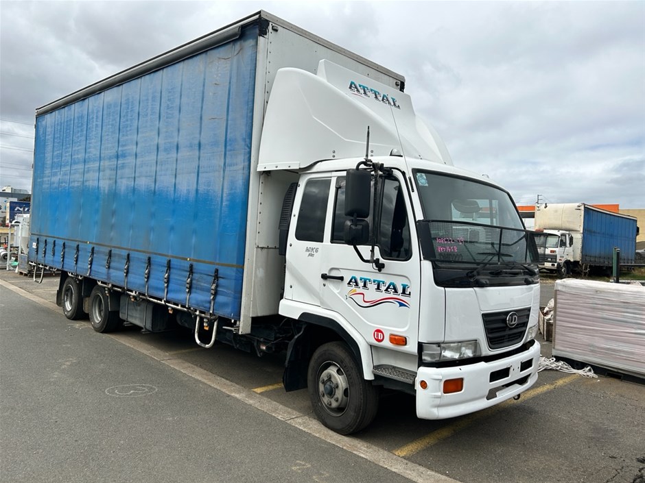 Unreserved 2010 UD Curtainsider & 1996 Isuzu Service Truck