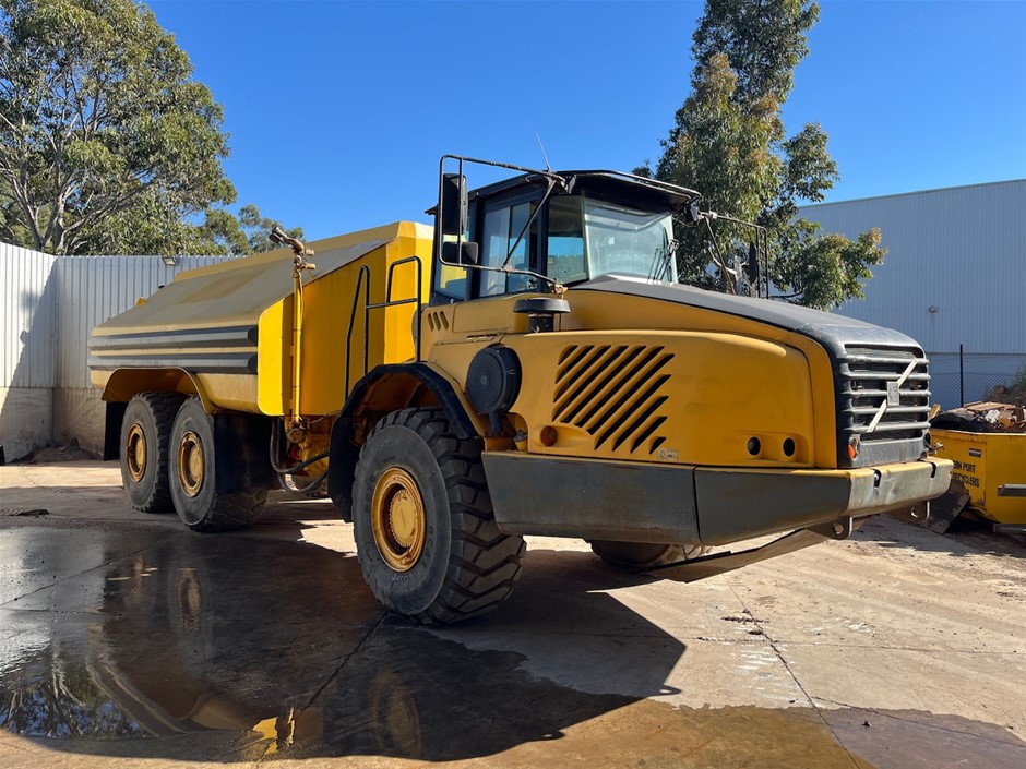 Volvo Wheel Loader, Volvo Water Cart & Allied Winch Dozers