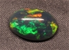 Solid Black Opal, weight 2.02 carats