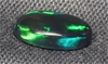 Solid Black Opal, weight .68 carats