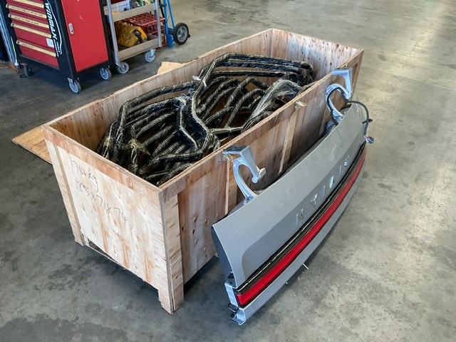 <p>Crate of Rivian Tray Rails and Tailgate</p>