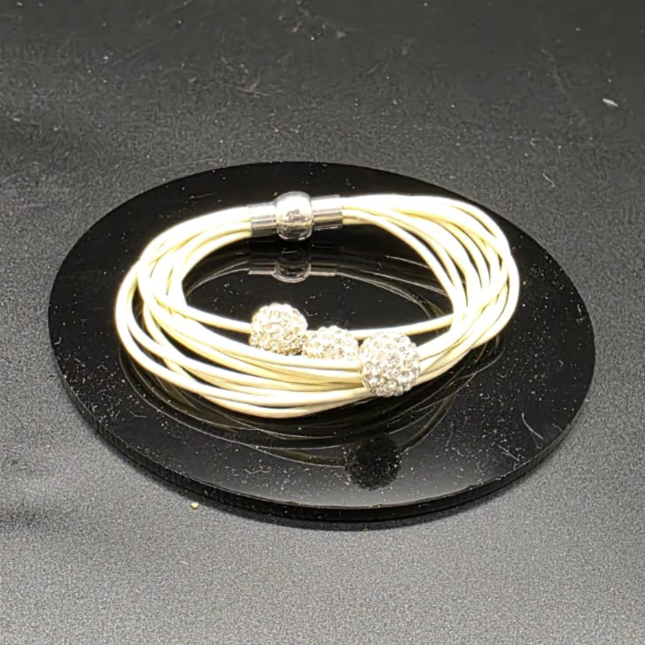 Designer Simulated Diamond Triple Ball Bracelet  with Multi Cream Bands