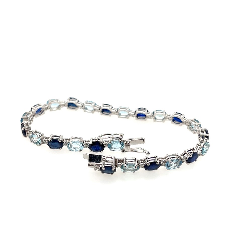 8.20ct Twelve Sapphire &5.65ct Aquamarine & 0.56ct Twenty Four Stones
