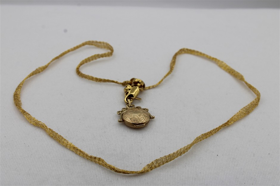 1 x Stamped 9ct Yellow Gold, Spinner Locket
