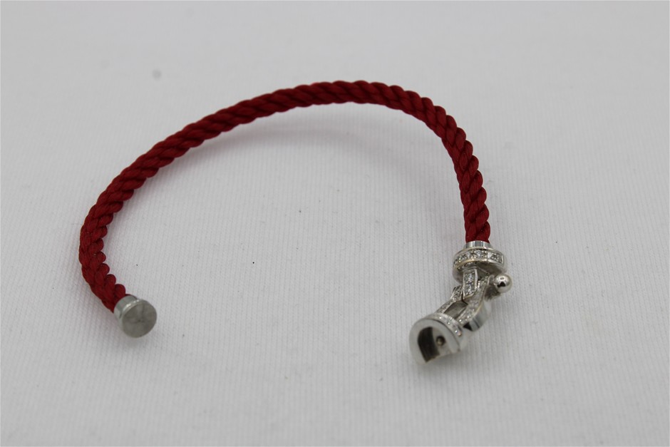 1 x Stamped 18ct White Gold, Force 10 Bracelet