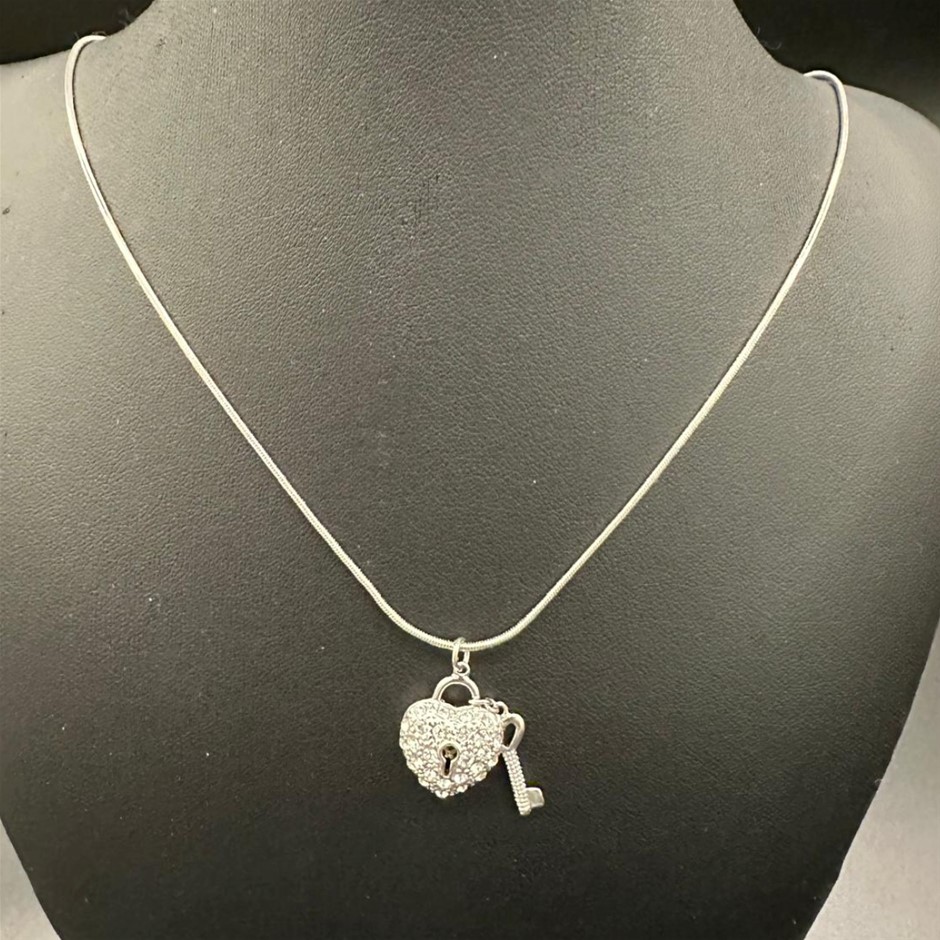 Stunning Lock & Key Pendant Featuring Crystals by Swarovski®