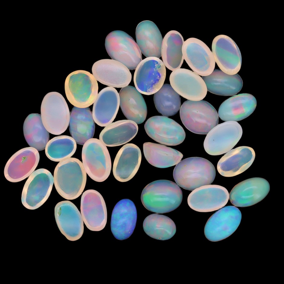 6.43 Carats White Color-Play Opal