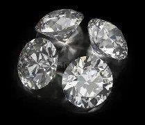0.16 Carat White 4 round diamonds