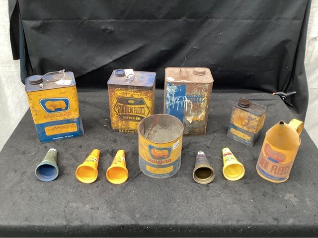 <p>Collection Of Assorted Golden Fleece Oil Cans And Funnels</p>