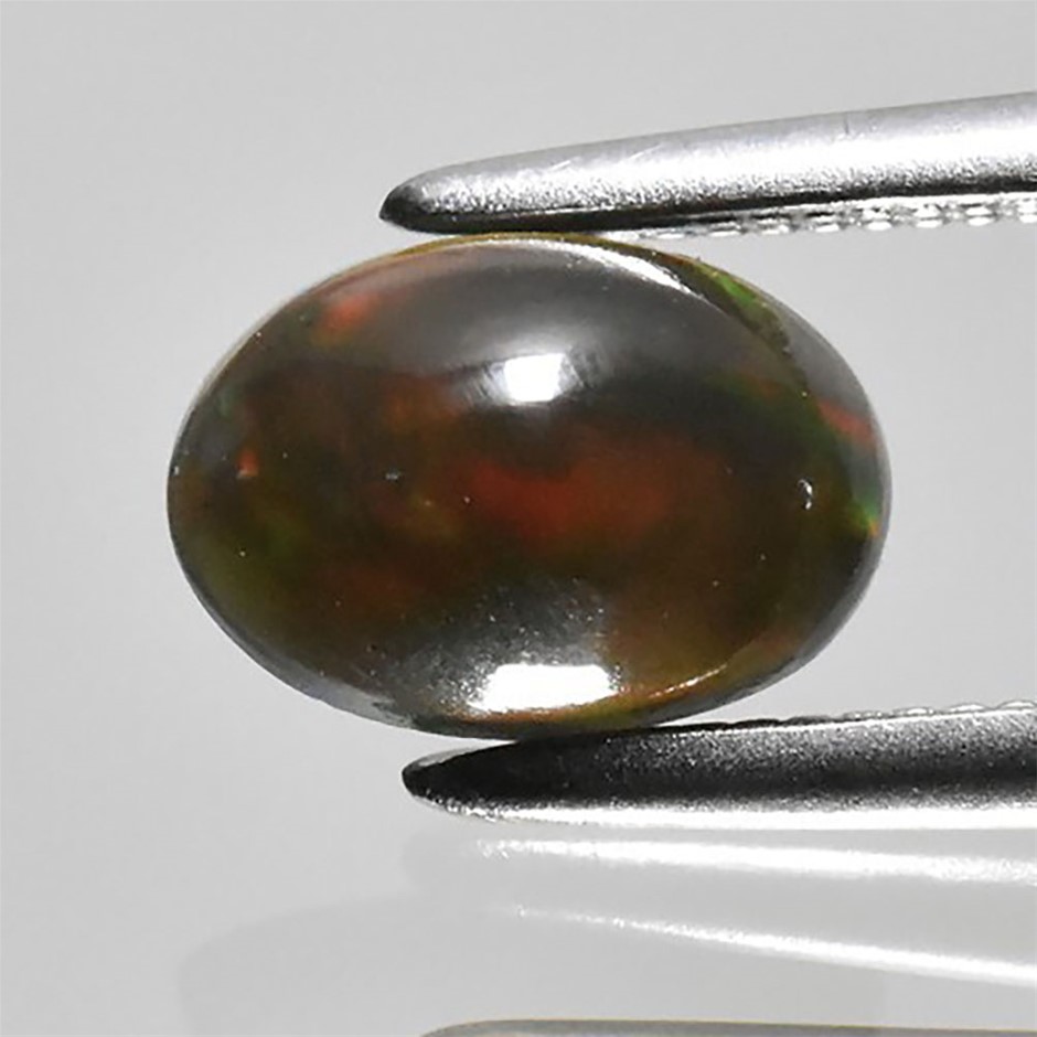 0.57ct Oval Cabochon Cut Play Of Color Black Opal Gemstones - 1Pc