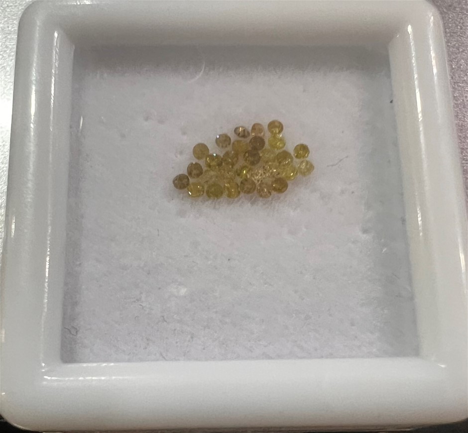 0.20 TCW yellow round various diamonds