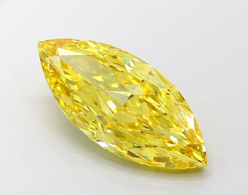 0.25 carat fancy Marquise vivid yellow diamond