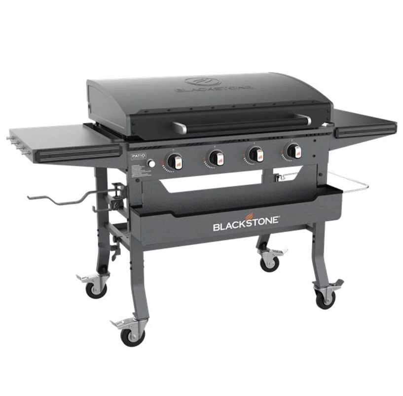 BLACKSTONE Omnivore Griddle With Hood And Soft Cover. NB: Condition unknown