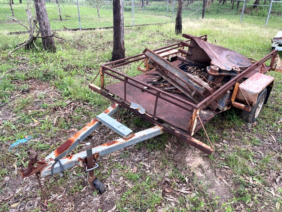 <p>Single Axle Steel Trailer and Cat Bucket</p>