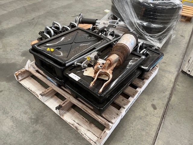 <p>Pallet of Rivian Suspension and Drive Components </p>