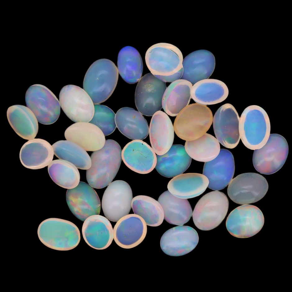 15.24 Carats White Color-Play Opal