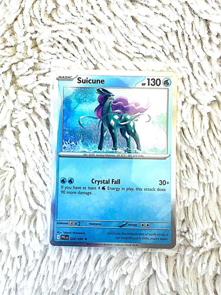 Suicune holo English card 026/094 legendary water Pokémon.