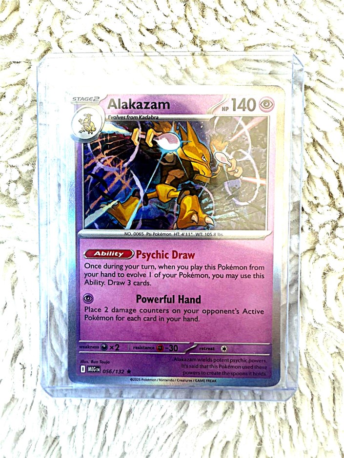 Alakazam English holo MEG 056/132 psychic evolution card.