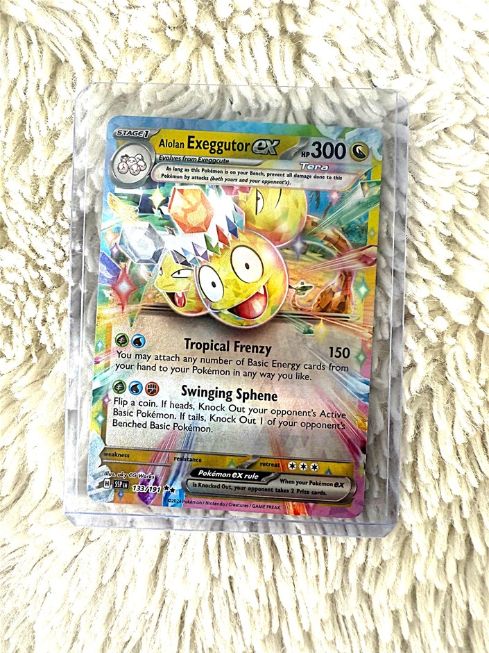 Alolan Exeggutor EX tera full art holo modern card.