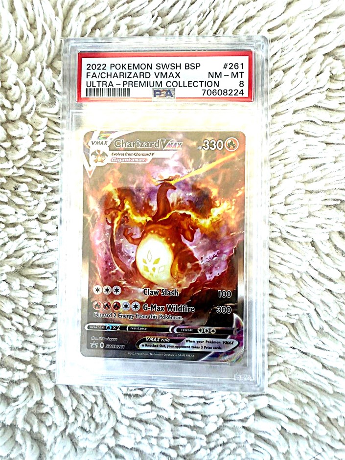 Charizard VMAX promo PSA 8 Ultra Premium Collection.