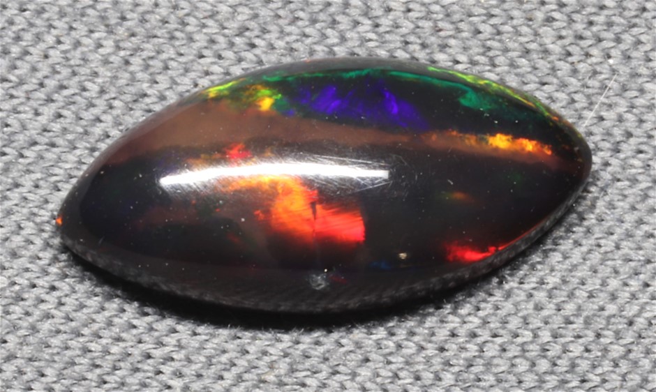Solid Black Opal, weight 1.59 carats