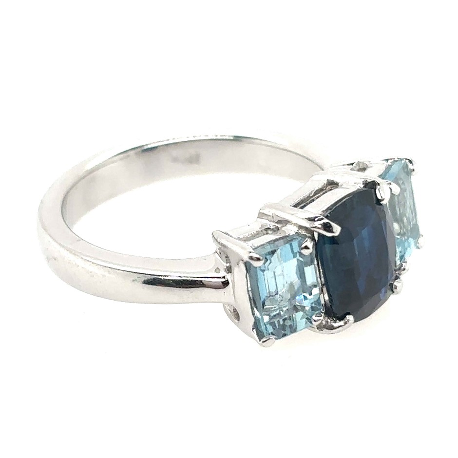 1.89ct a centre cushion cut Blue Sapphire With AIG Cert. & 1.20ct 2 emerald