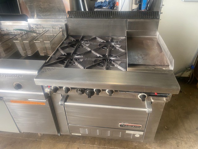 <p>Garland 4 Burner Oven and Grill</p>