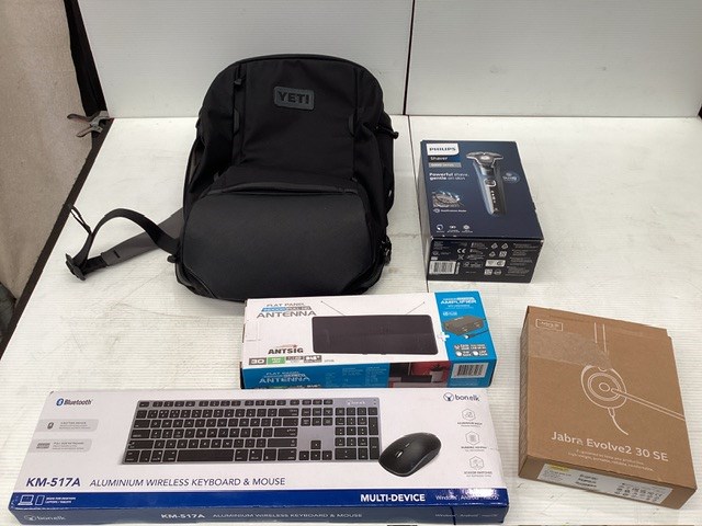 Yeti Backpack Containing Assorted Items
