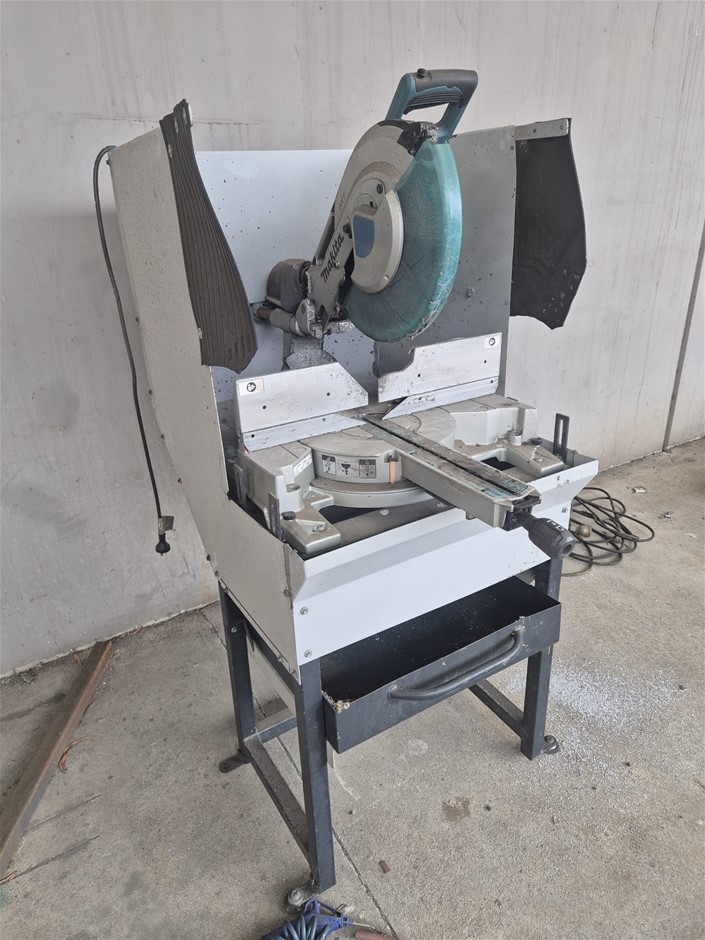 Makita single phase aluminium drop saw on stand