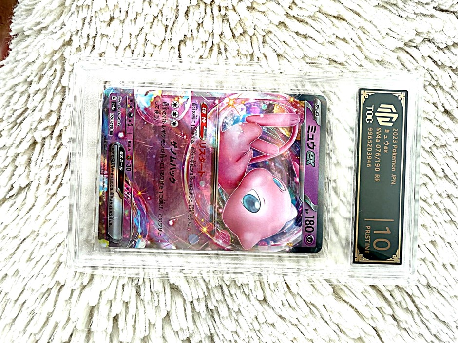 Pristine 10 Mew ex card with vibrant art of the iconic Mythical Pokémon.