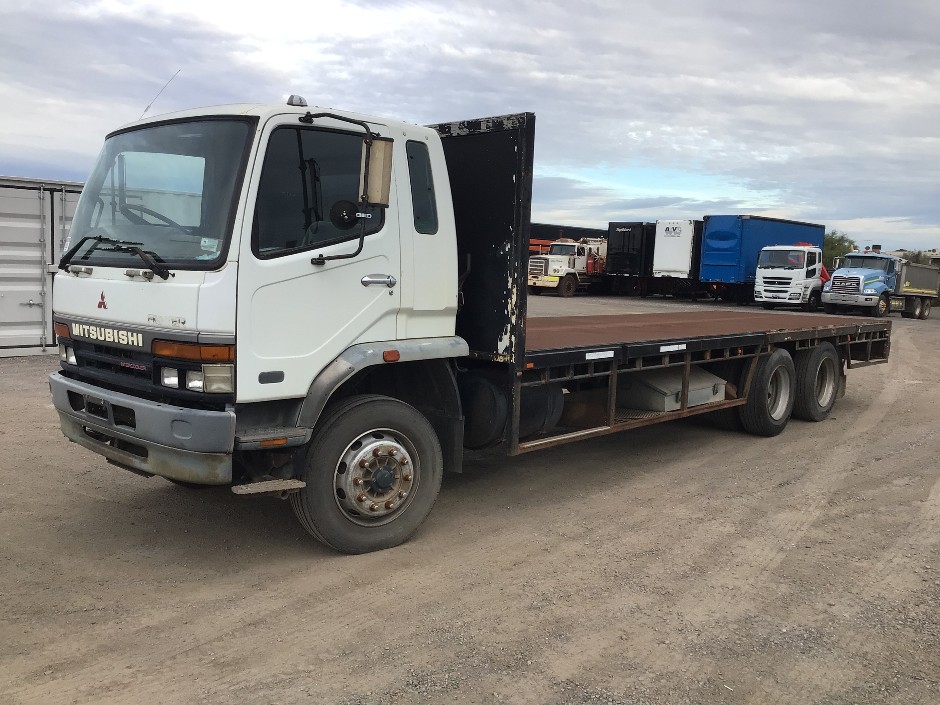 <p>1999 Mitsubishi FM 600 Fighter   6x2 Tray Truck</p>