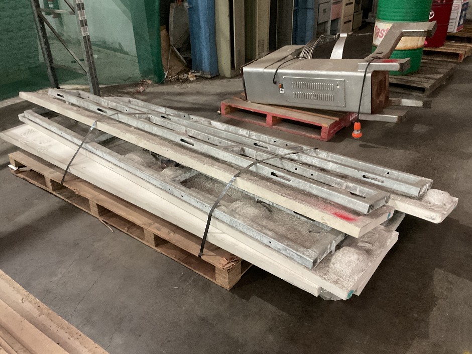 Pallet Of Metal Frames & Concrete Wall Segments (Assumed)
