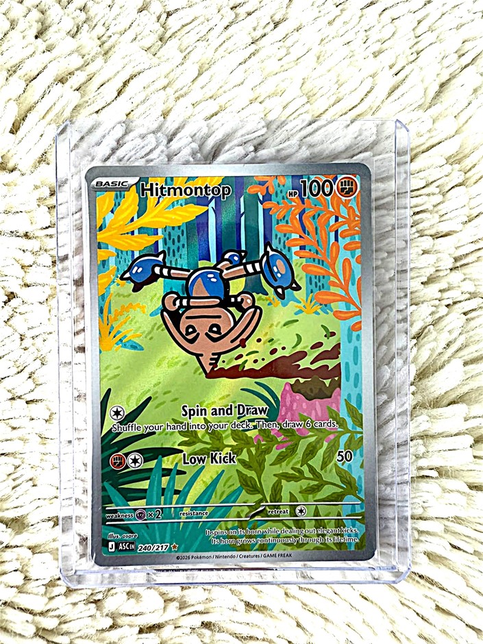 Hitmontop Illustration Rare card the Fighting-type Pokémon in colourful.