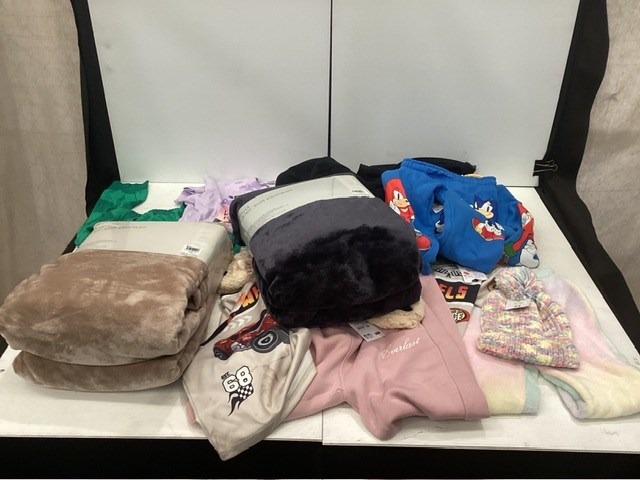 Assorted Clothing And Blankets