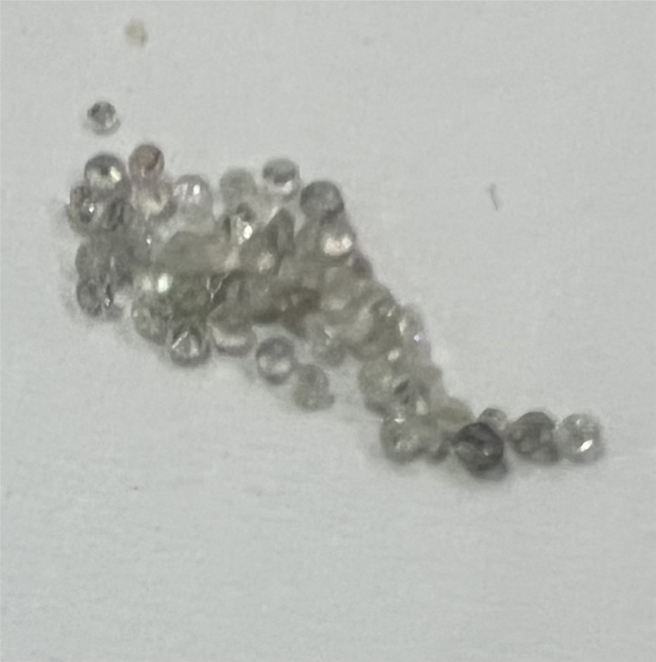 0.33 TCW white various round diamonds